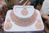 Rose gold necklace set with earrings 
Name: Rose gold necklace set with earrings 
Base Metal: Alloy
